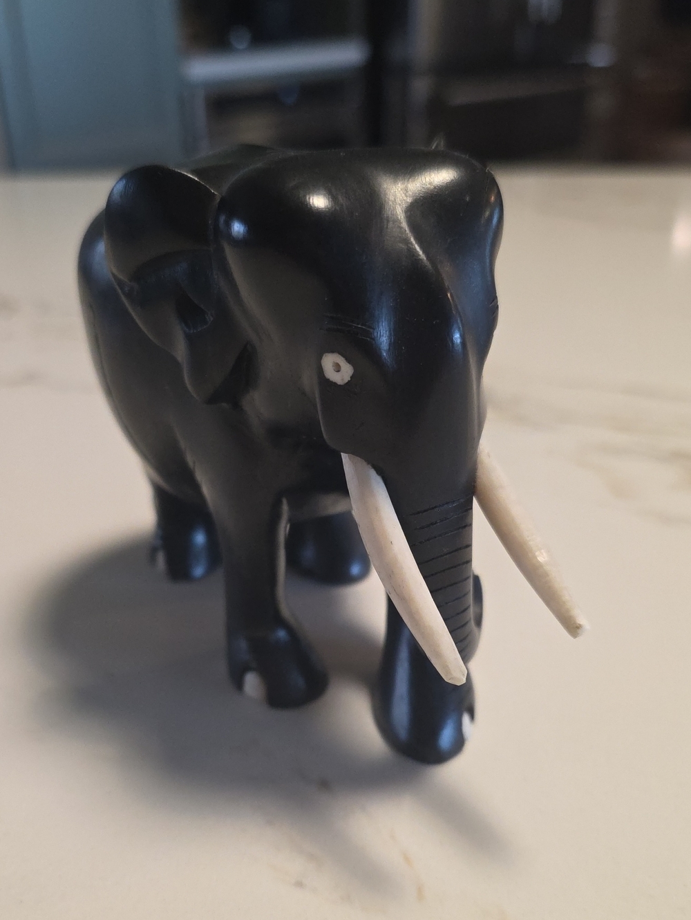 Vtg Black Handcrafted Wooden Elephant Figurine with Ivory-Tone Tusks